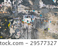 Old painted background wall with pieces of paper 29577327