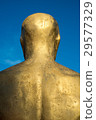 Backside of golden man. Figure 29577329