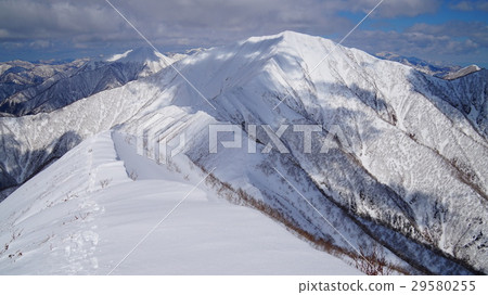 View of the ridgeline of the Hidaka Mountains Pirikanupuri beyond the ridgeline of the Hidaka Mountains 29580255