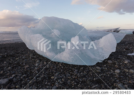 Natural Ice cube breaking on black sand beach 29580483