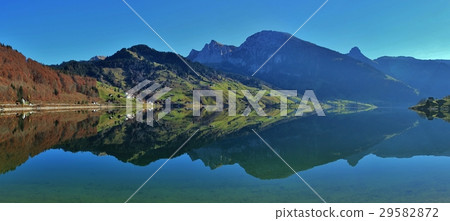 Village Innerthal reflecting in lake Wagital. 29582872