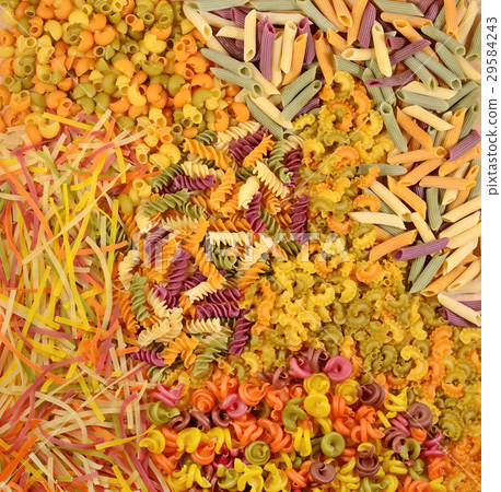 Assortment of colored uncooked Italian pasta 29584243