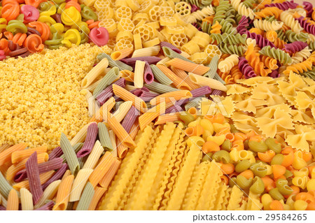 Assortment of colored uncooked Italian pasta 29584265