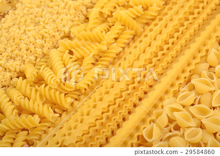 Assortment of uncooked Italian pasta close up 29584860
