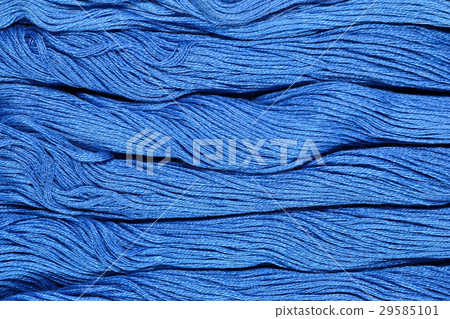 Blue skeins of floss as background texture Blue skeins of floss as background texture 29585101
