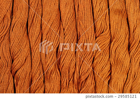 Brown skeins of floss as background texture Brown skeins of floss as background texture 29585121