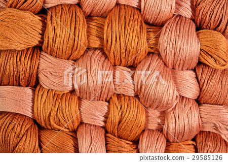 Brown twisted skeins of floss as background Brown twisted skeins of floss as background 29585126