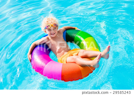 Child with toy ring in swimming pool 29585243