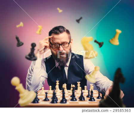 Chess player calculate movies and game strategy 29585363