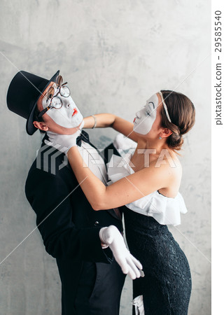 Two pantomime theater artists performing 29585540