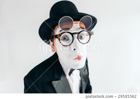 Pantomime actor face in glasses and makeup mask 29585562