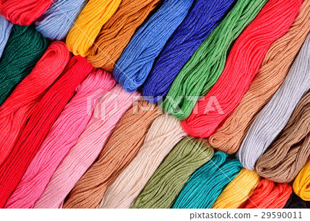 Colorful skeins of floss as background texture Colorful skeins of floss as background texture 29590011