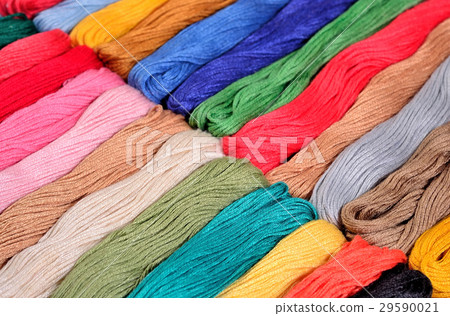 Colorful skeins of floss as background texture Colorful skeins of floss as background texture 29590021