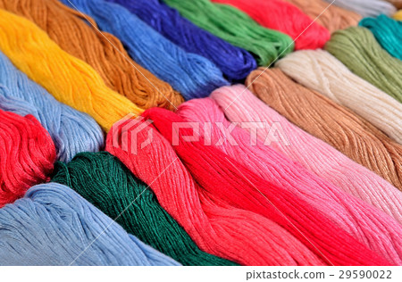 Colorful skeins of floss as background texture Colorful skeins of floss as background texture 29590022