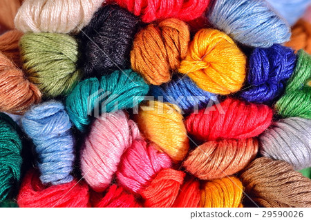 Colorful skeins of floss as background texture Colorful skeins of floss as background texture 29590026