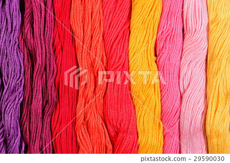 Colorful skeins of floss as background texture Colorful skeins of floss as background texture 29590030