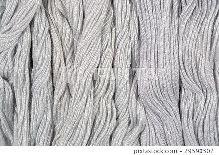 Gray skeins of floss as background texture Gray skeins of floss as background texture 29590302