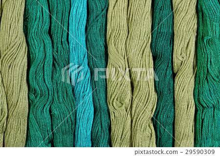 Green skeins of floss as background texture Green skeins of floss as background texture 29590309