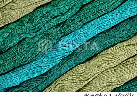 Green skeins of floss as background texture Green skeins of floss as background texture 29590310