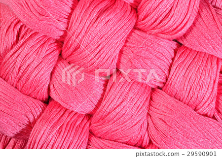Pink twisted skeins of floss as background texture Pink twisted skeins of floss as background texture 29590901