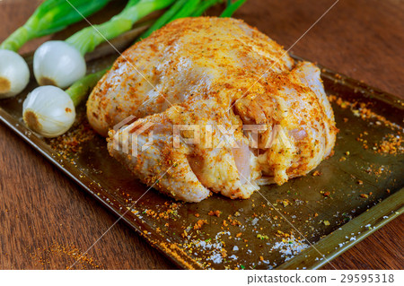 Whole chicken seasoned uncooked Whole chicken seasoned uncooked 29595318