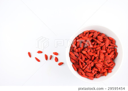 dried goji berries in a small white bowl 29595454
