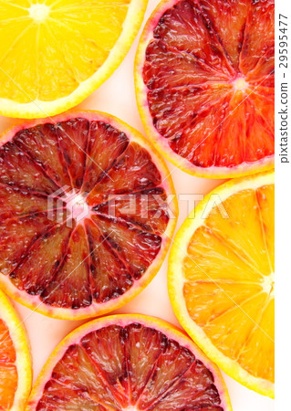 slices of fresh blood orange fruits background slices of fresh blood orange fruits background 29595477