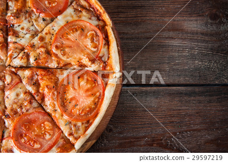 Hot traditional pizza, fast food. Italian cuisine. Hot traditional pizza, fast food. Italian cuisine. 29597219