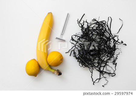 Banana and lemon with razor, shaved man balls 29597974
