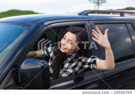 Angry woman in a car Angry woman in a car 29598769