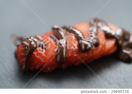 sliced ripe strawberry with dark premium chocolate sliced ripe strawberry with dark premium chocolate 29600138