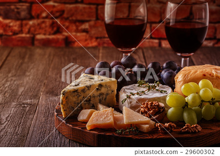 Cheese, nuts, grapes and red wine  29600302