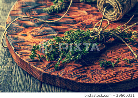 Thyme on old wooden board 29600331