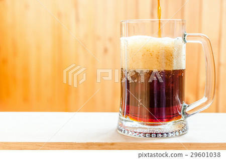 Beer pouring into mug Beer pouring into mug 29601038