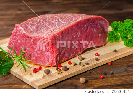 big raw boneless beef meat with pepper, rosemary big raw boneless beef meat with pepper, rosemary 29601405
