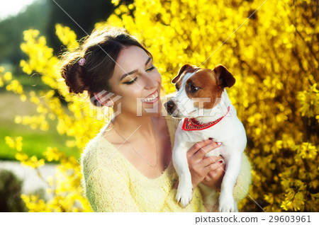 Beautiful young brunette woman enjoying in park 29603961