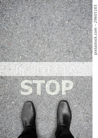 Black shoes standing at the STOP line Black shoes standing at the STOP line 29605165