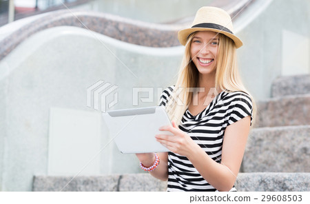 Girl using tablet pc 29608503