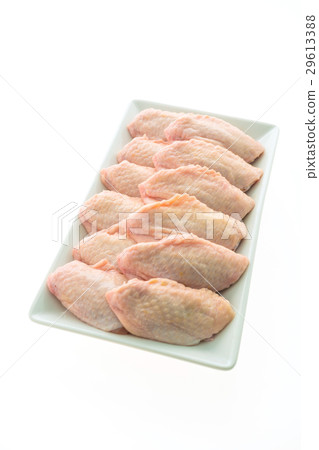 Raw chicken meat and wing in white plate 29613388