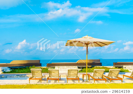 Umbrella and chair with sea view Umbrella and chair with sea view 29614159