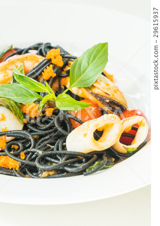 Black Spaghetti with seafood in white plate Black Spaghetti with seafood in white plate 29615937
