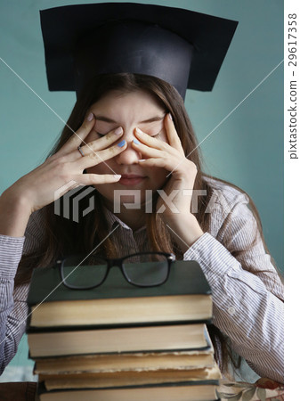 teenager student girl in graduation cap with bood teenager student girl in graduation cap with bood 29617358
