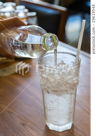 Drinking water pouring from pvc bottle. 29619548