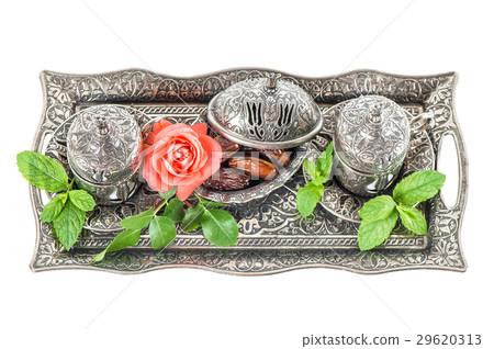 Holidays tea table setting withdates, mint leaves 29620313