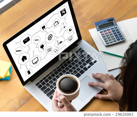 people using smart phone,laptop, online communic 29620861