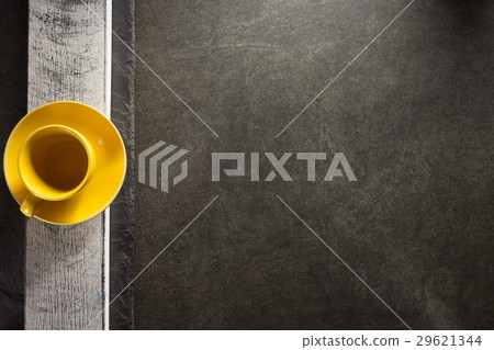 empty cup and saucer at table 29621344