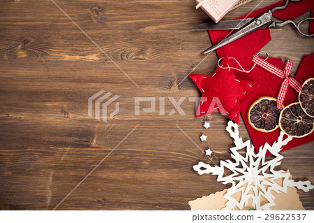 Handmade holiday decorations and scissors at right Handmade holiday decorations and scissors at right 29622537