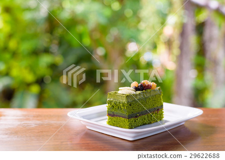 Green tea layer cake with mix berries currant. Green tea layer cake with mix berries currant. 29622688