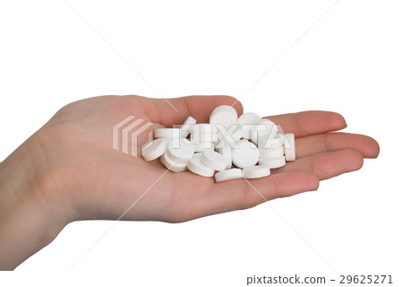 Woman Hand holding pills isolated on white 29625271