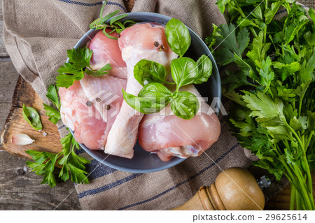Raw chicken legs for bbc with herbs and spices Raw chicken legs for bbc with herbs and spices 29625614